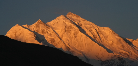 first sunrays strike the rakaposhi peak.JPG